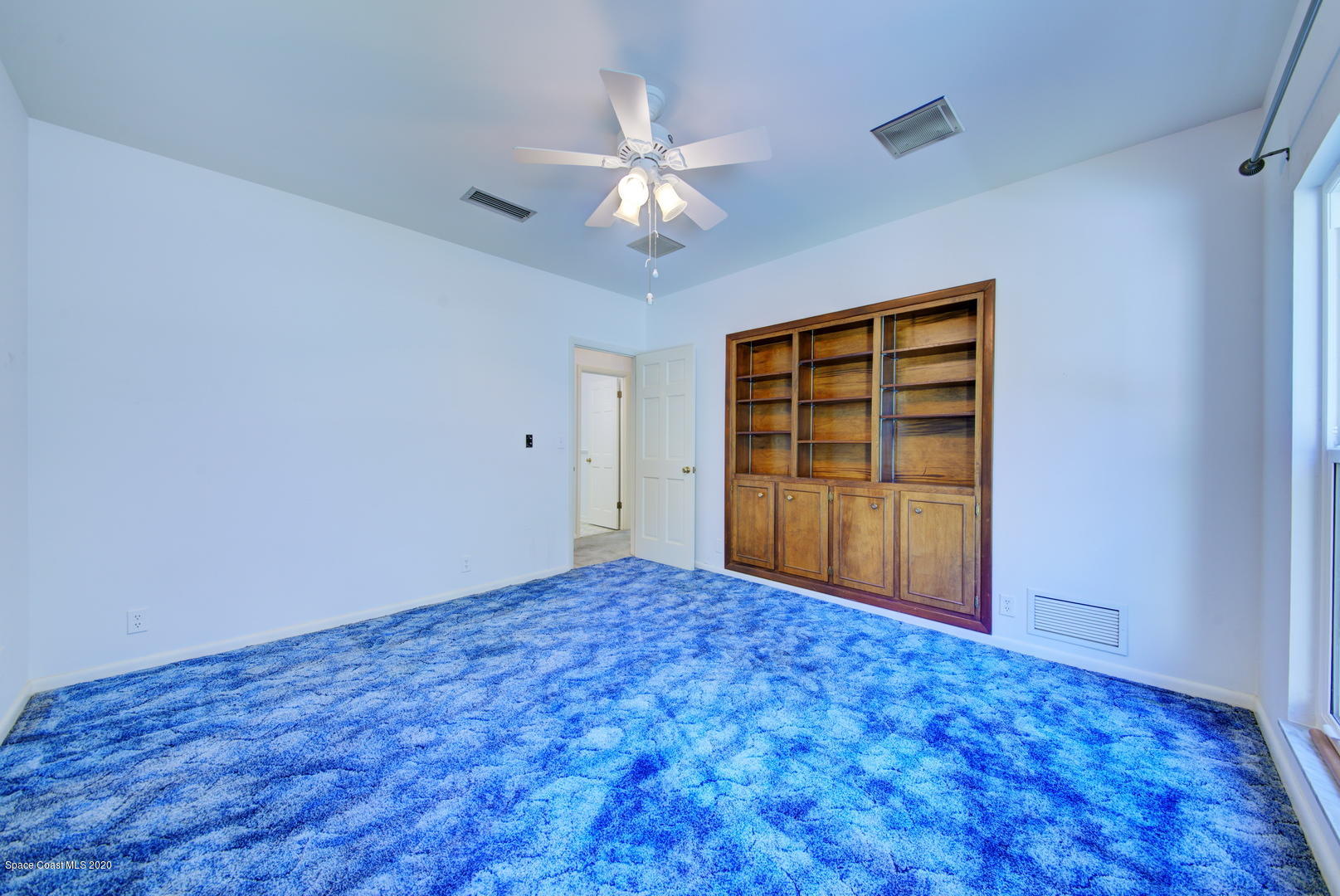 2175 Turpentine Road Mims, FL 32754 - Photo 38 of 67 Bedroom 2 with Built-iin Bookcase