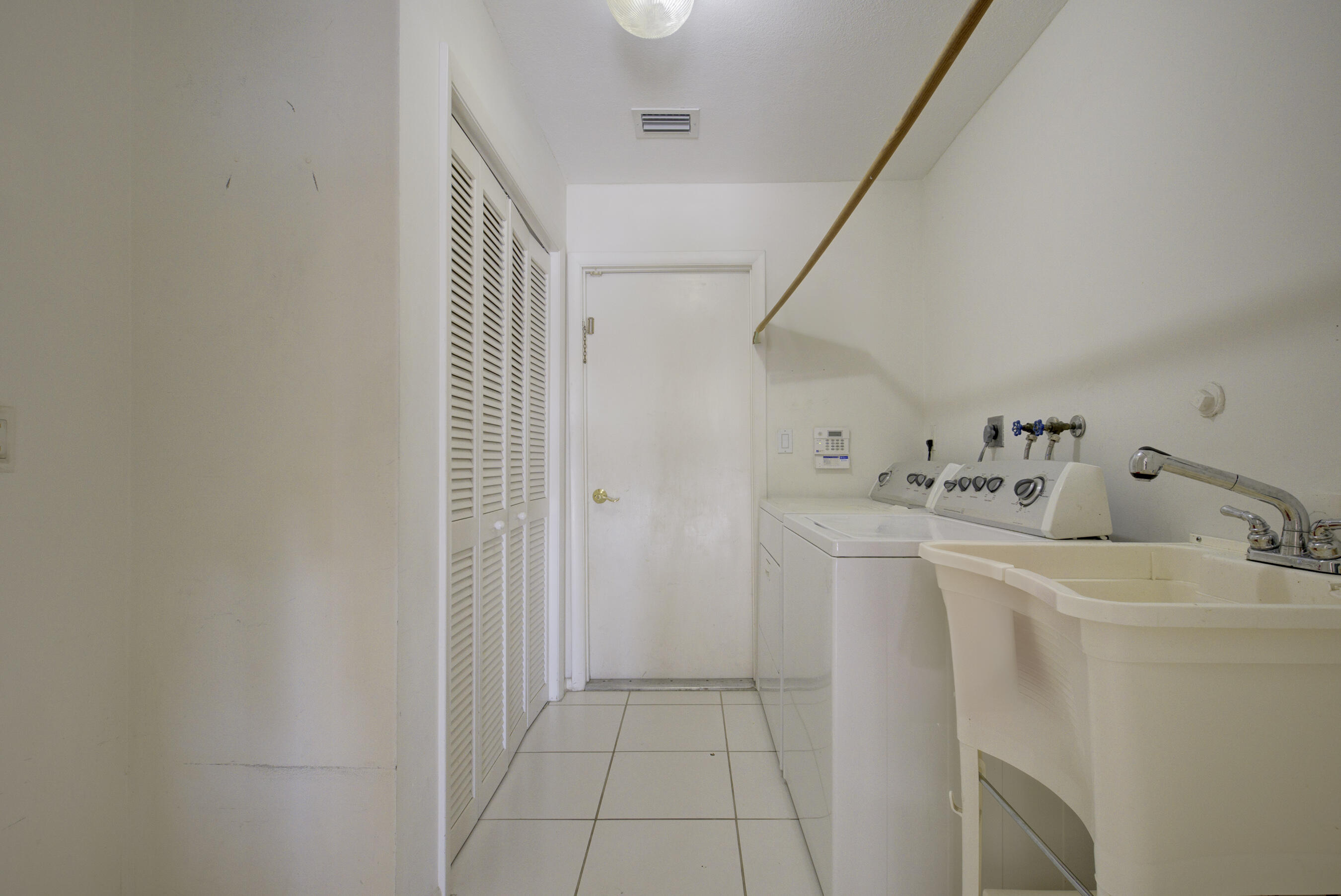 7441 Estrella Circle Boca Raton, FL 33433 - Photo 40 of 57 LAUNDRY ROOM