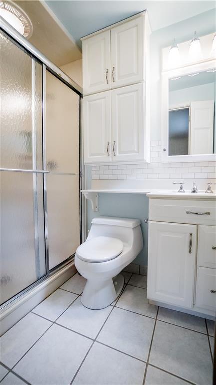308 Beech Road Butler, PA 16001 - Photo 21 of 25 Convenient Walk-in Shower and Extra Bathroom Storage