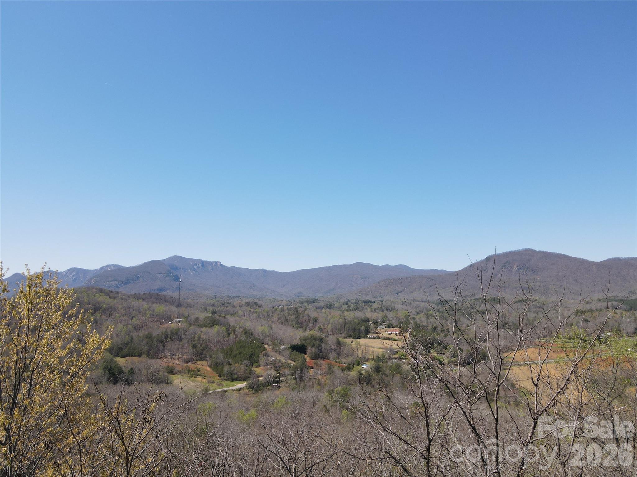 600 High Pines Loop Lake Lure, NC 28746 - Photo 2 of 38 a view of a mountain range with trees