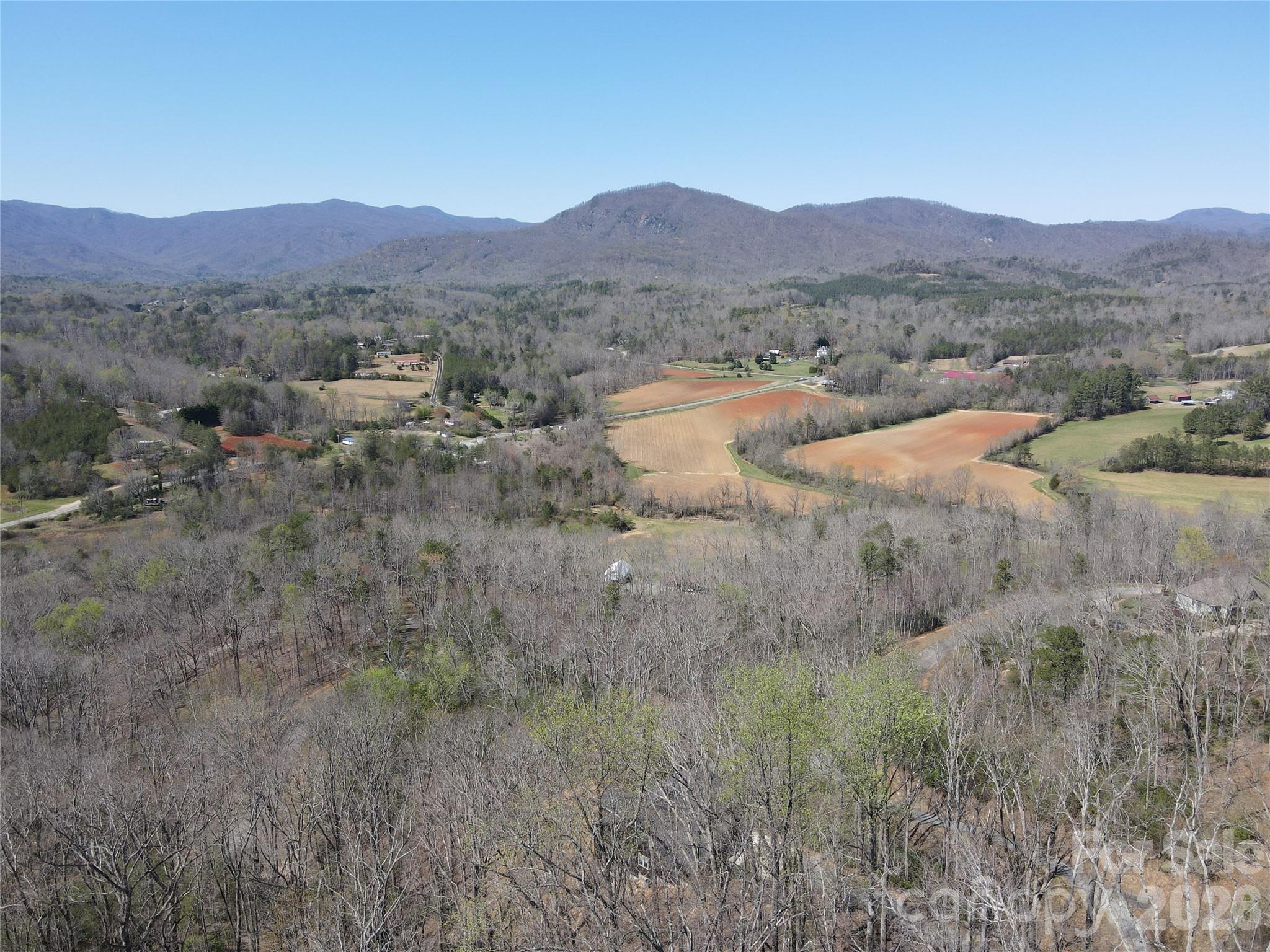 600 High Pines Loop Lake Lure, NC 28746 - Photo 21 of 38 a view of a town with trees in the background