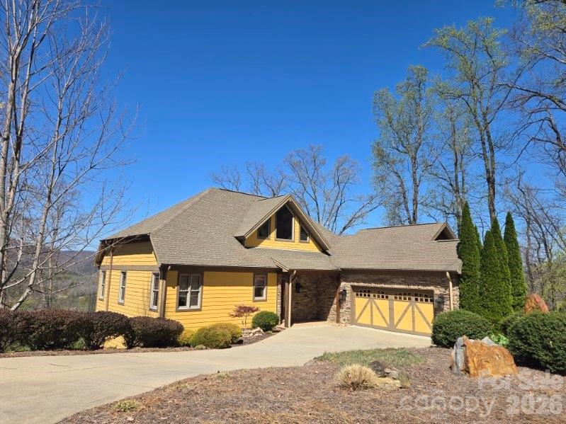 600 High Pines Loop Lake Lure, NC 28746 - Photo 29 of 38 a front view of a house with a yard