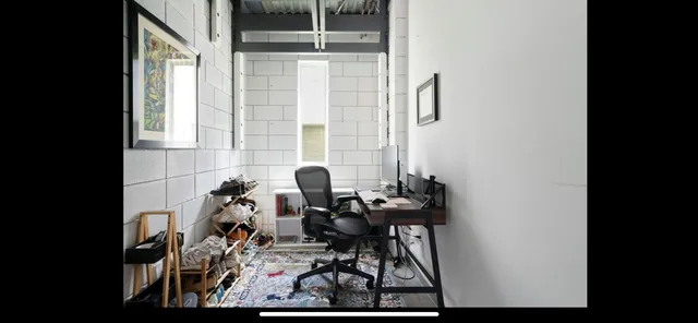 a table and chairs in a balcony