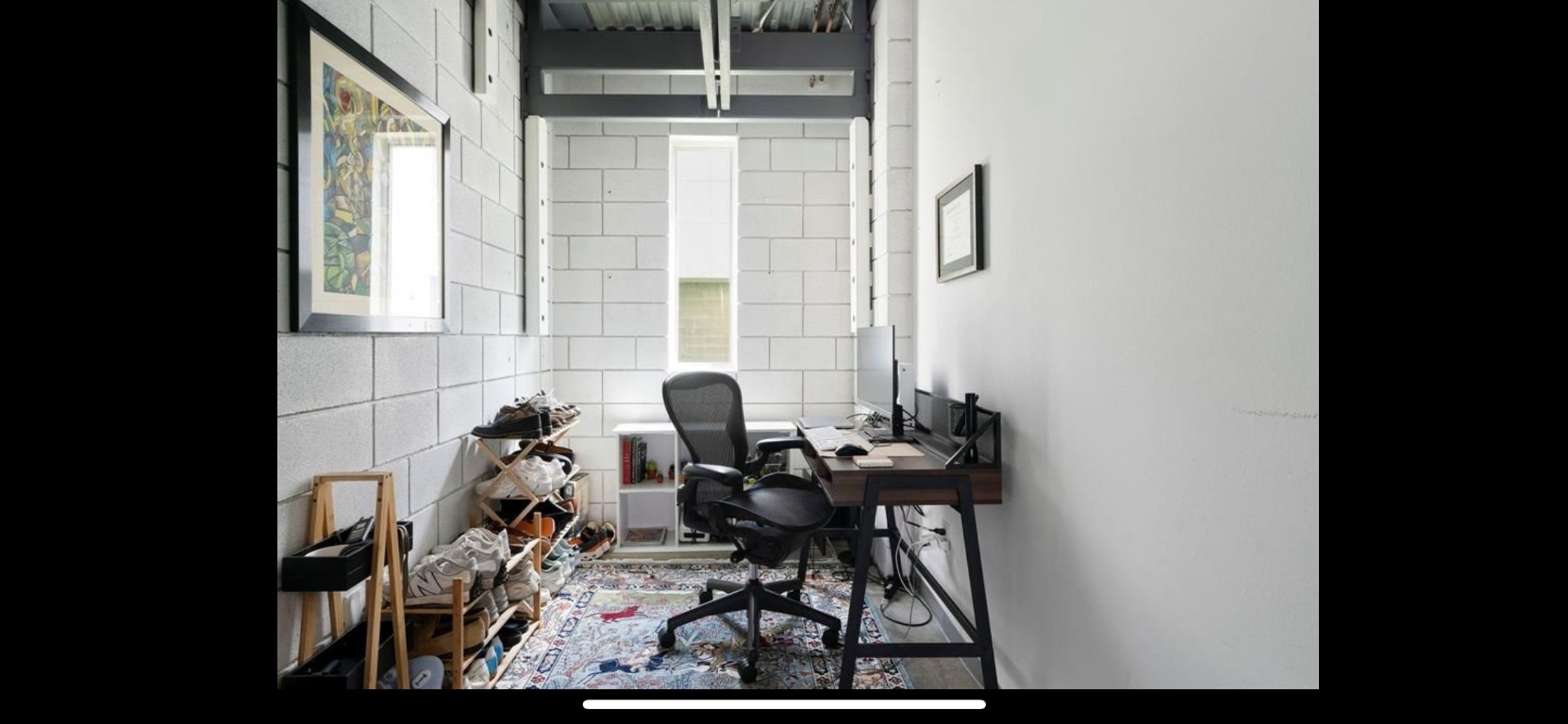 4801 South Congress Avenue, Unit F4 Austin, TX 78745 - Photo 17 of 22 a table and chairs in a balcony