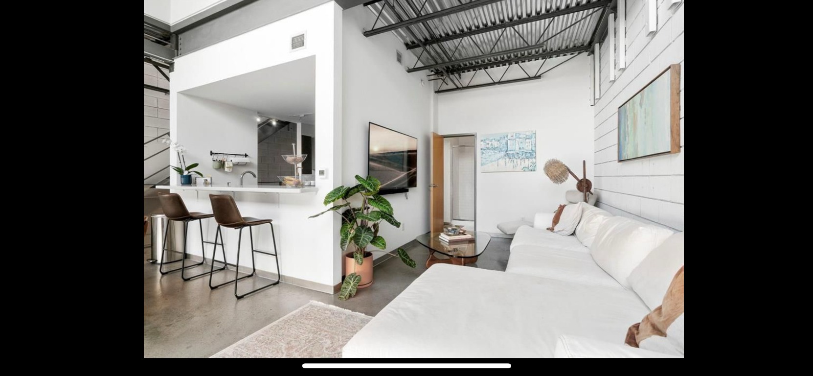 4801 South Congress Avenue, Unit F4 Austin, TX 78745 - Photo 4 of 22 a living room with furniture and a table