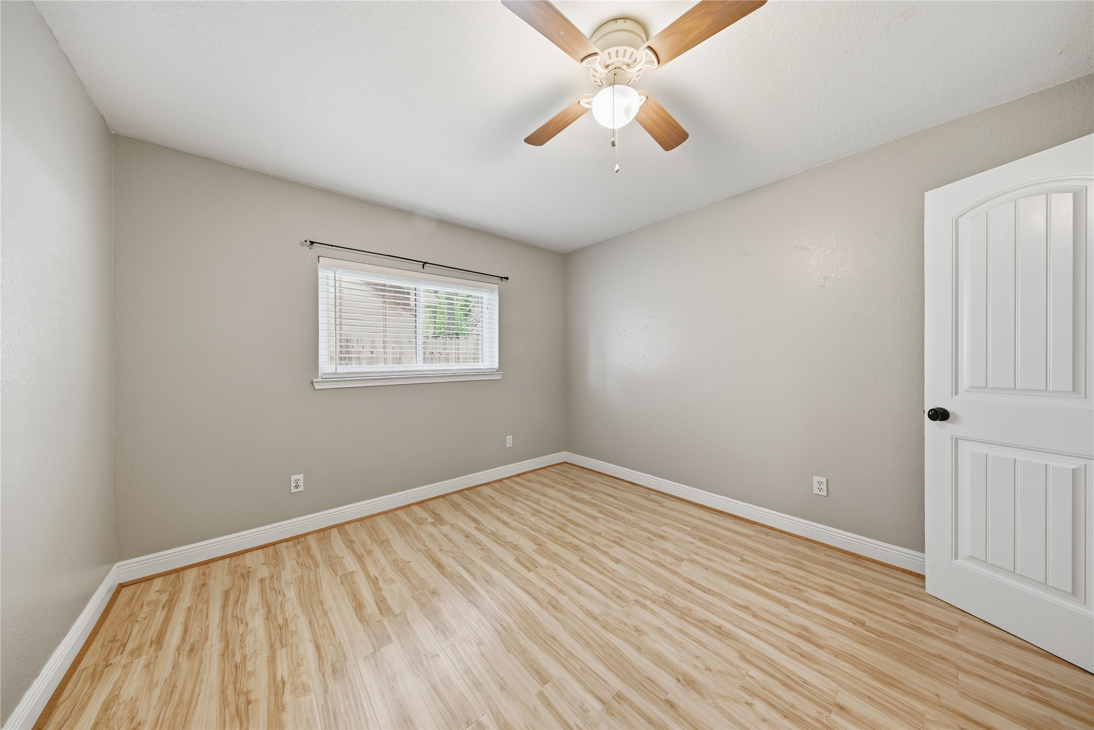 13506 Spring Court Tomball, TX 77375 - Photo 28 of 37 wooden floor in an empty room with a window