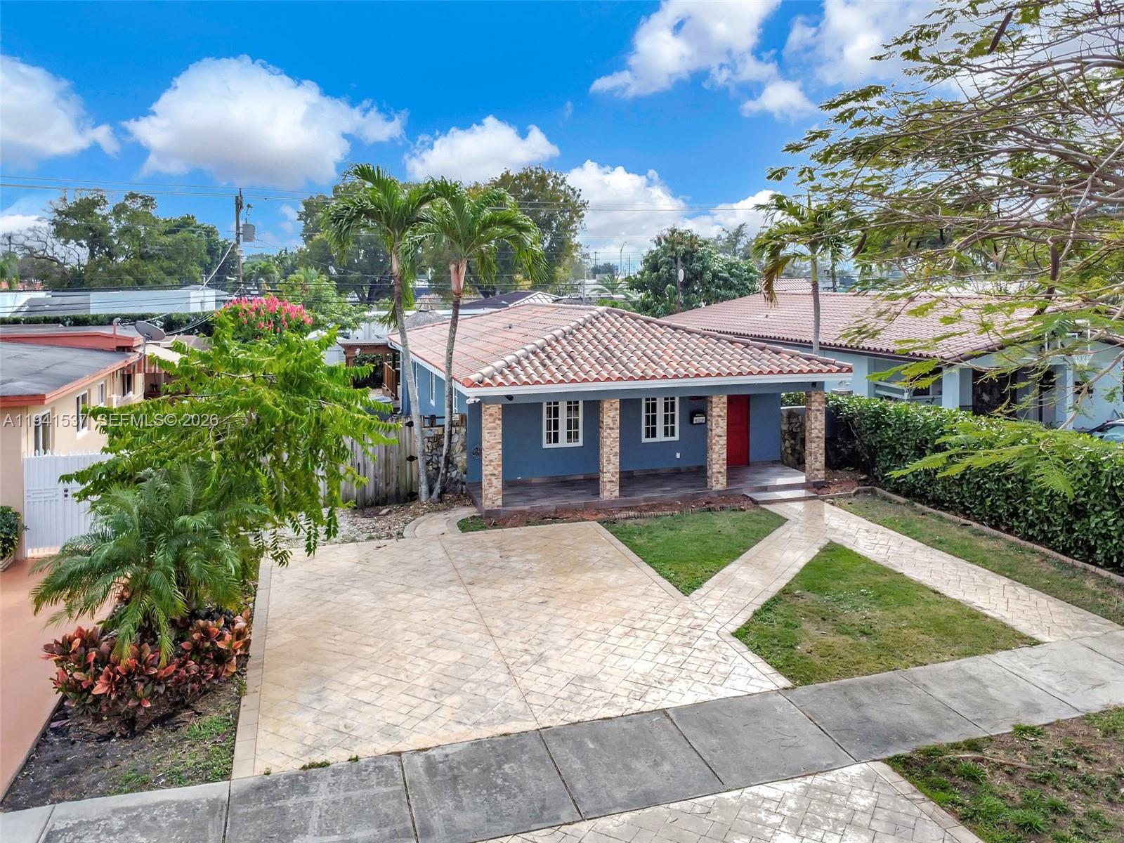 a view of house with garden