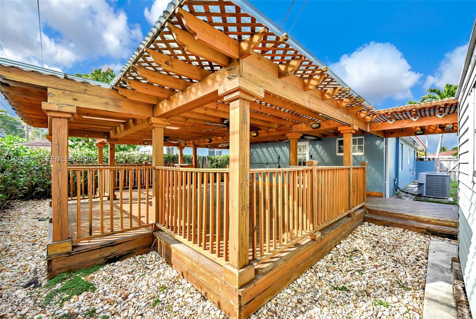 6560 Southwest 39th Street Miami, FL 33155 - Photo 17 of 17 a view of porch with wooden floor