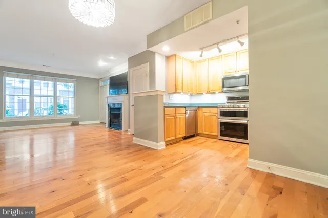 a view of a kitchen with a sink