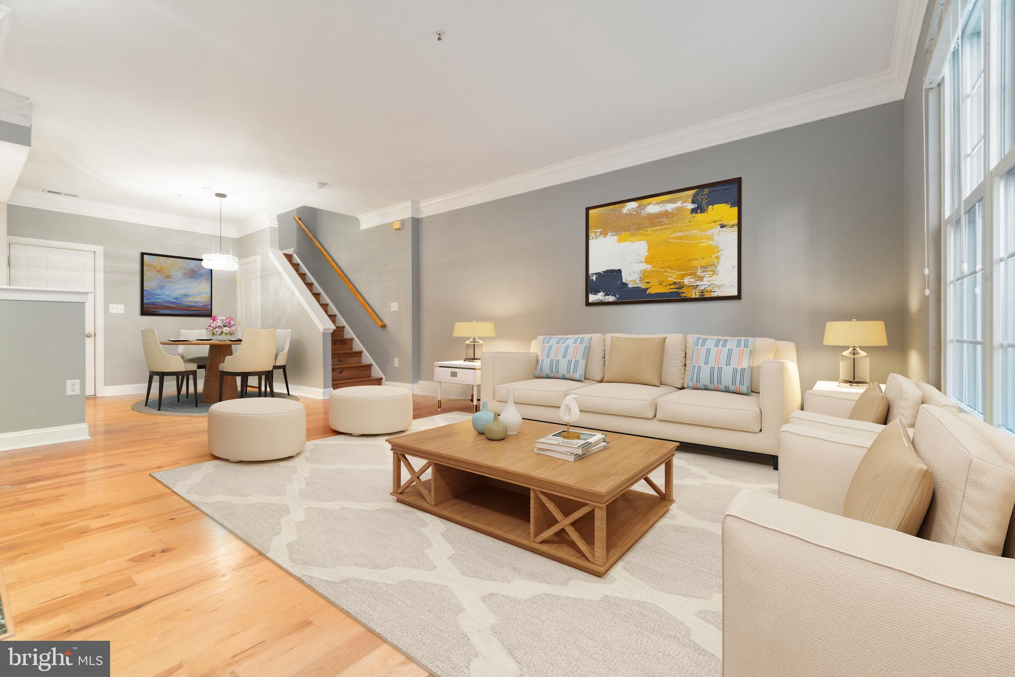 104 Bucksfield Road, Unit 104 Gaithersburg, MD 20878 - Photo 2 of 39 a living room with furniture and wooden floor
