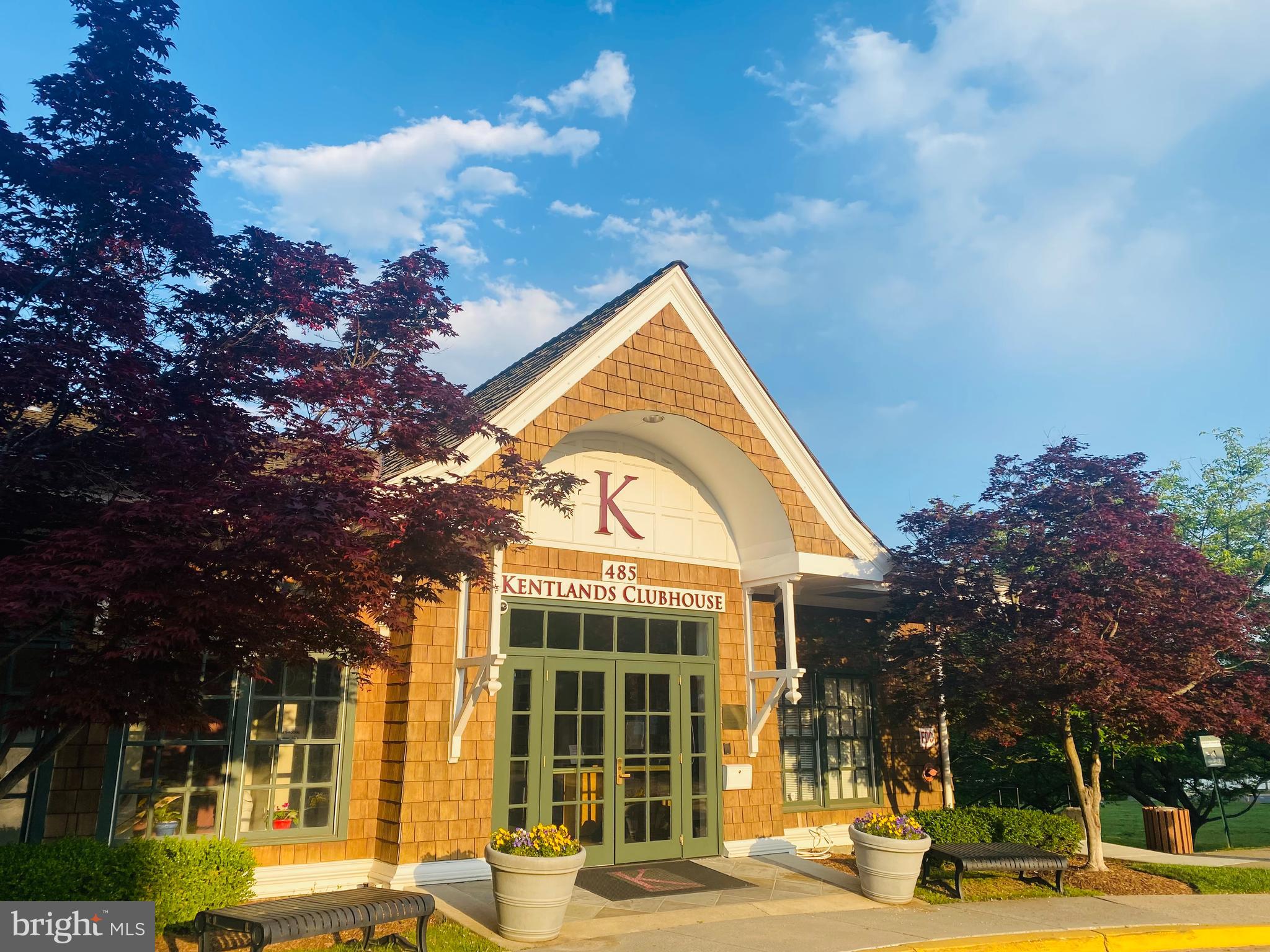 104 Bucksfield Road, Unit 104 Gaithersburg, MD 20878 - Photo 34 of 39 a view of a building with a garden