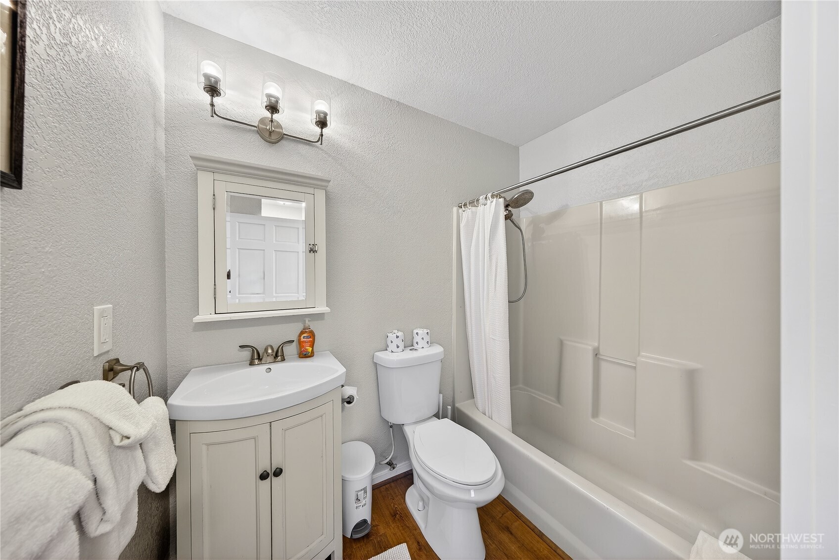 5972 Hastings Road Clinton, WA 98236 - Photo 26 of 40 a bathroom with a sink toilet and shower