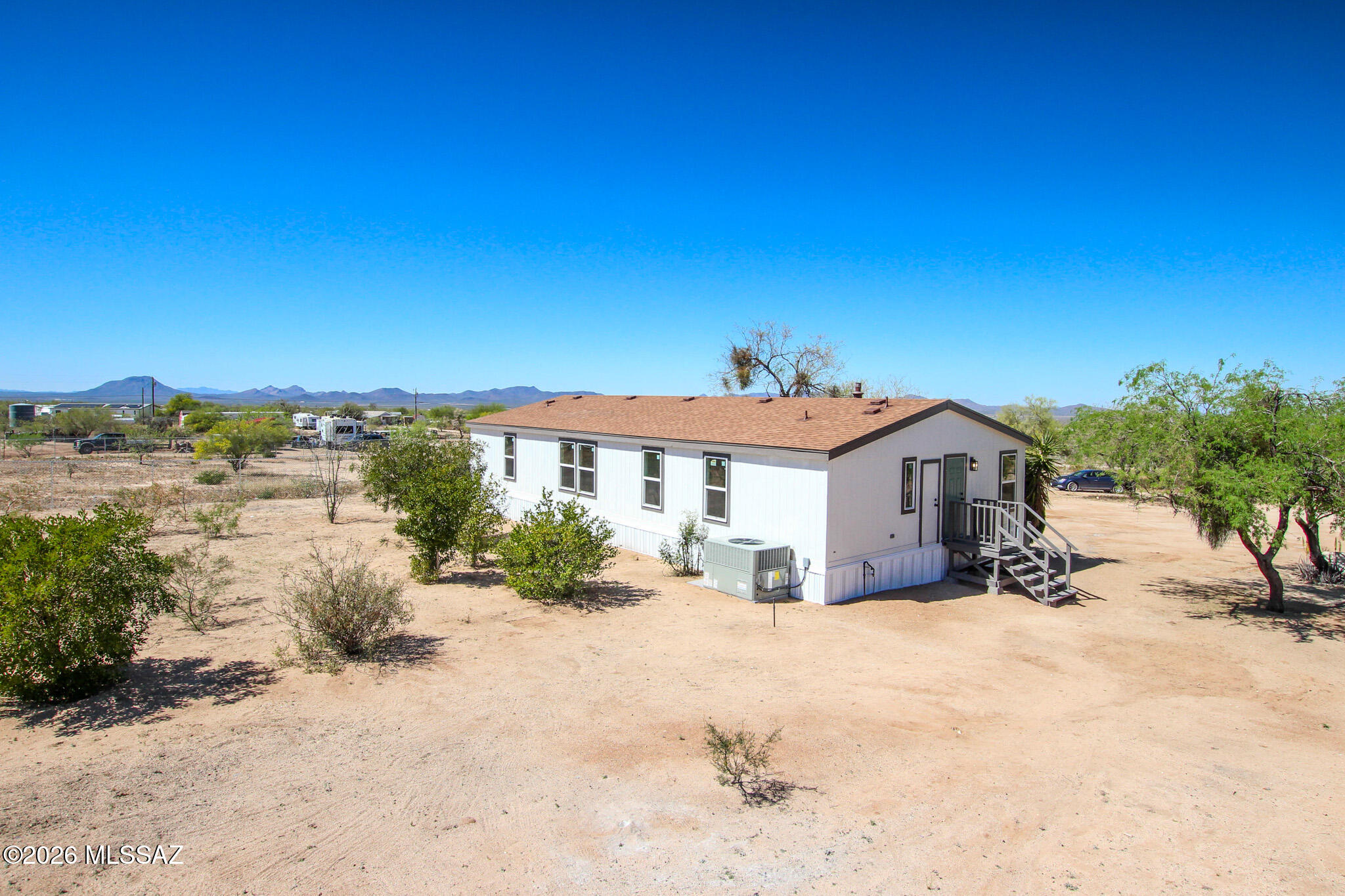14303 West Rolina Lane Tucson, AZ 85736 - Photo 35 of 38 a view of a house with a yard