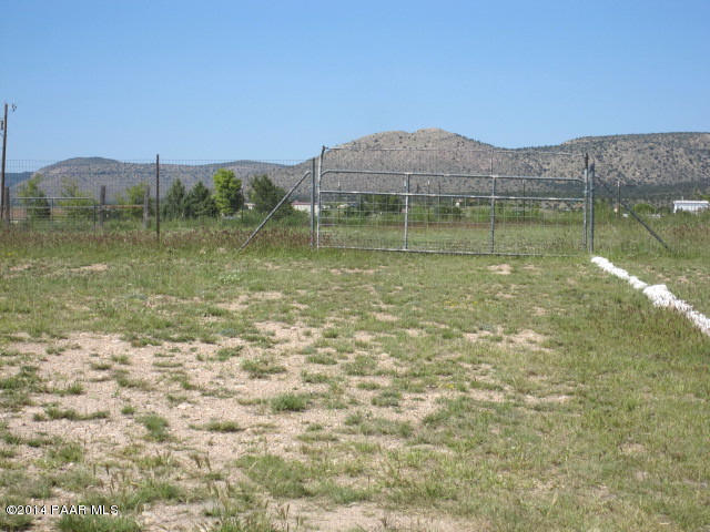 850 West Iris Road Paulden, AZ 86334 - Photo 16 of 17 a view of a lake with a mountain in the background