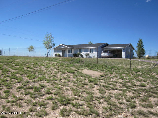 850 West Iris Road Paulden, AZ 86334 - Photo 2 of 17 a house view with a garden space