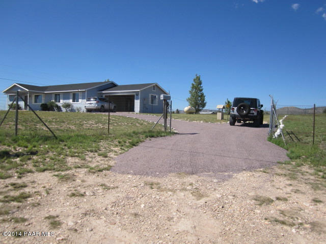 850 West Iris Road Paulden, AZ 86334 - Photo 3 of 17 a view of a house with a yard
