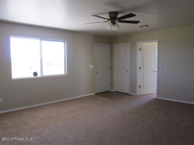 850 West Iris Road Paulden, AZ 86334 - Photo 4 of 17 a view of an empty room with a window