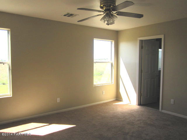 850 West Iris Road Paulden, AZ 86334 - Photo 8 of 17 a view of an empty room with a window
