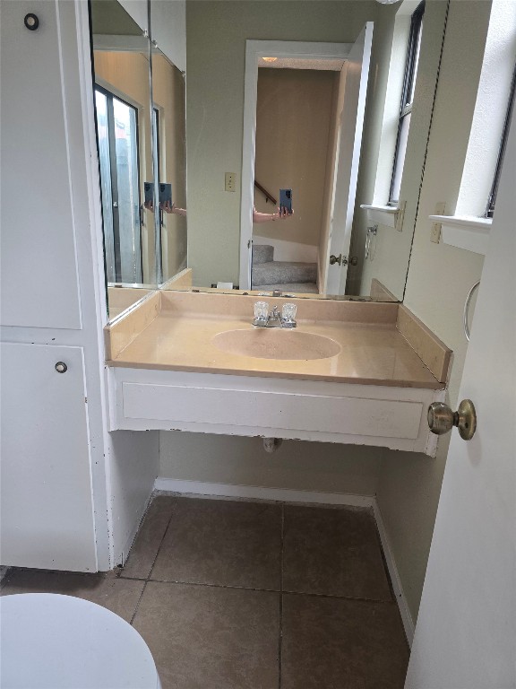 1221 Hopkins Street, Unit 8 San Marcos, TX 78666 - Photo 7 of 14 a bathroom with a sink and a mirror