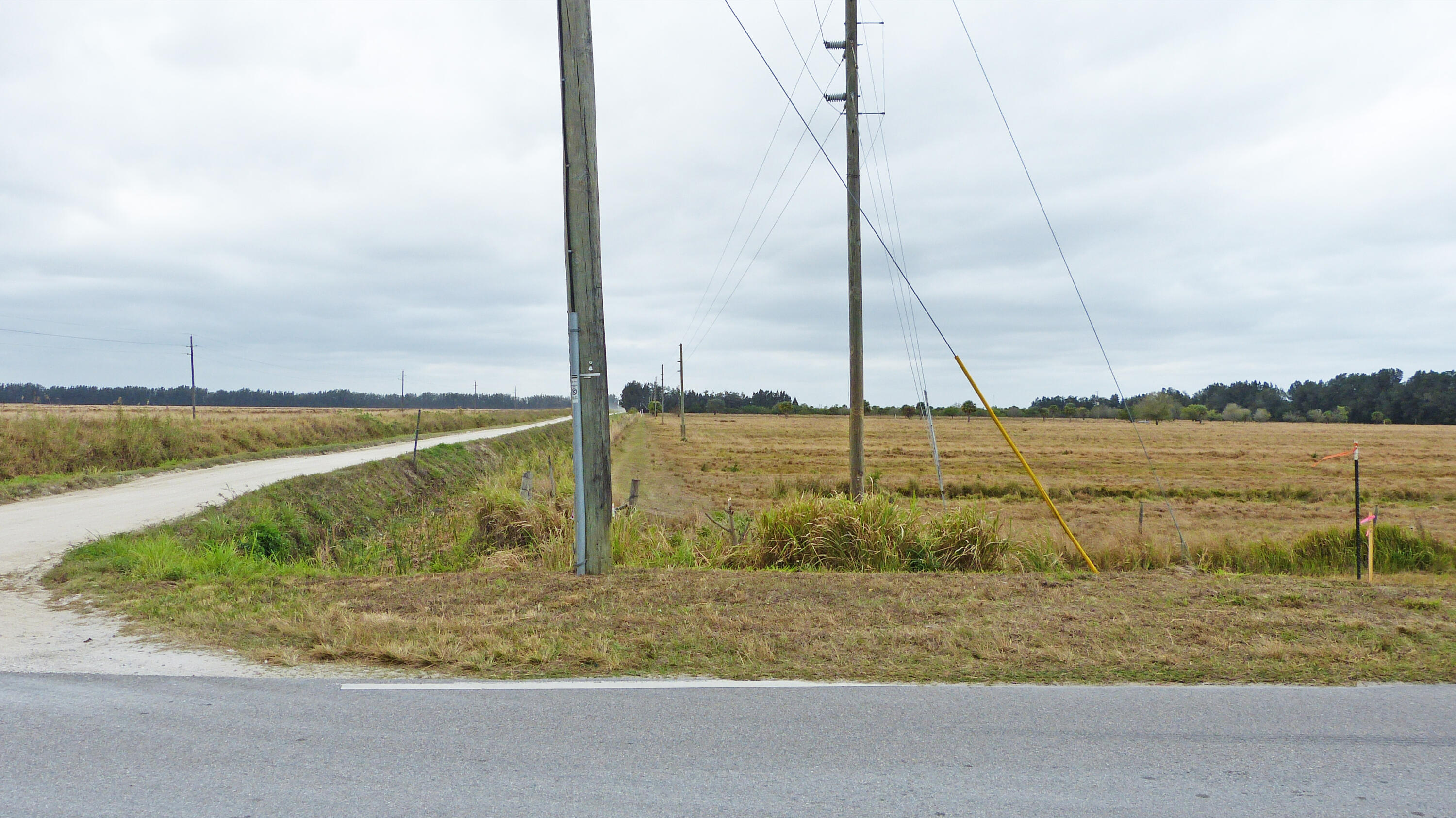 Tbd South Header Canal Road Fort Pierce, FL 34945 - Photo 4 of 6 a view of a lake with a beach
