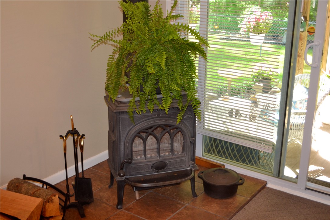 833 Dewitt Road Webster, NY 14580 - Photo 5 of 20 Wood burning stove