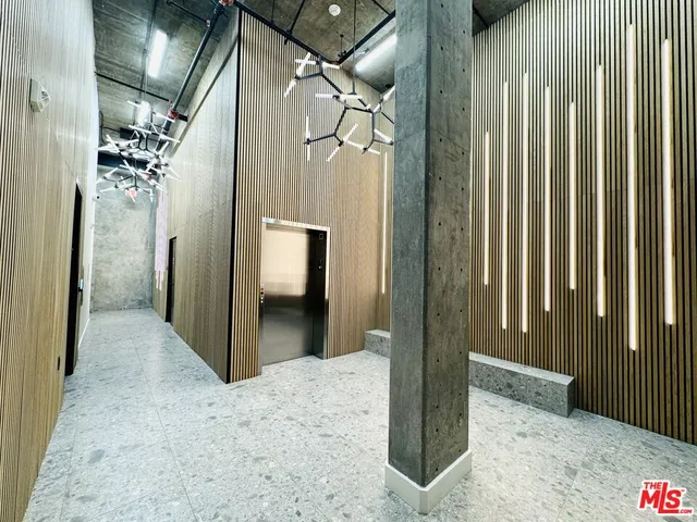 a view of a street with a building in the background