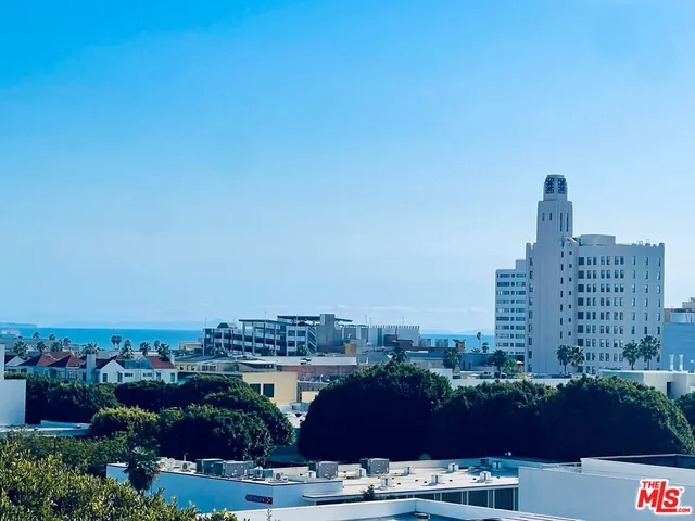 a view of a city with tall buildings