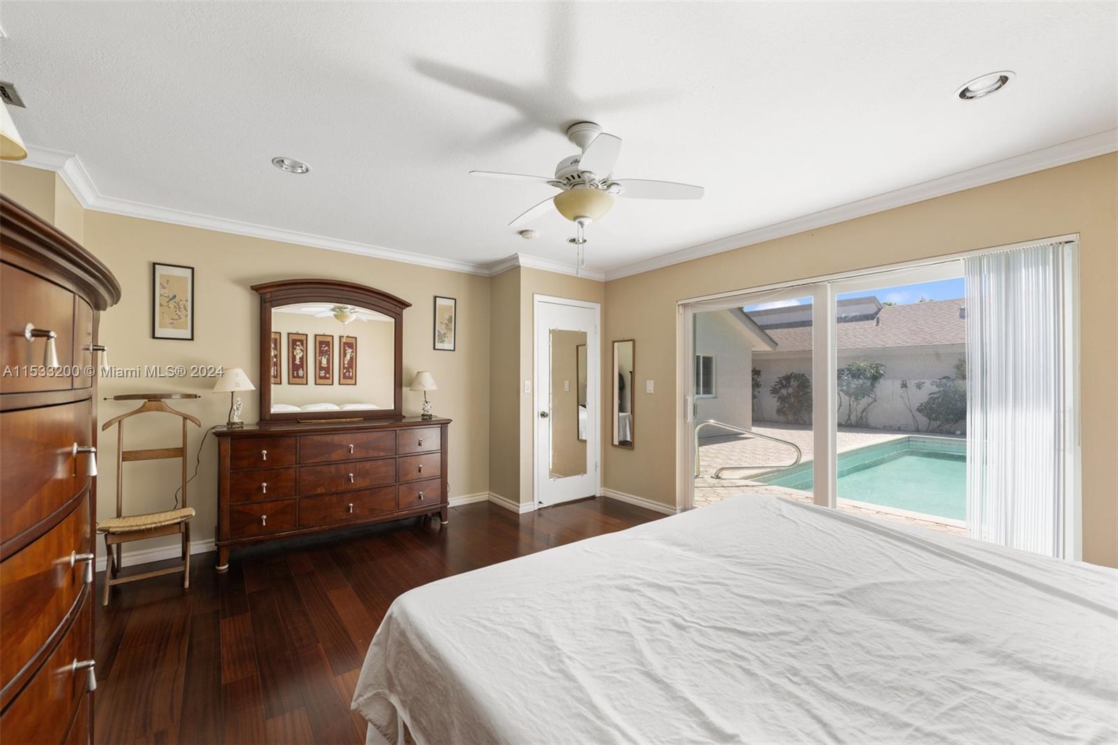 113 Kensington Road Hollywood, FL 33021 - Photo 14 of 32 Master bedroom with views to the pool deck