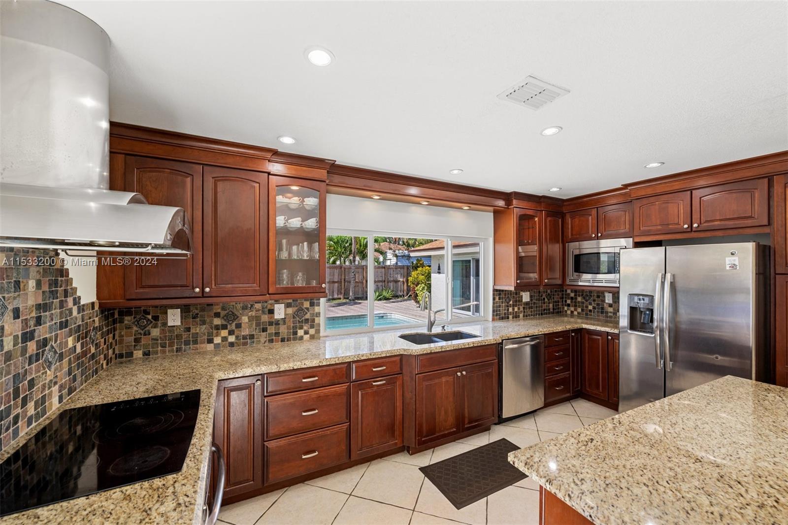 113 Kensington Road Hollywood, FL 33021 - Photo 3 of 32 Updated Kitchen-With Wine cooler