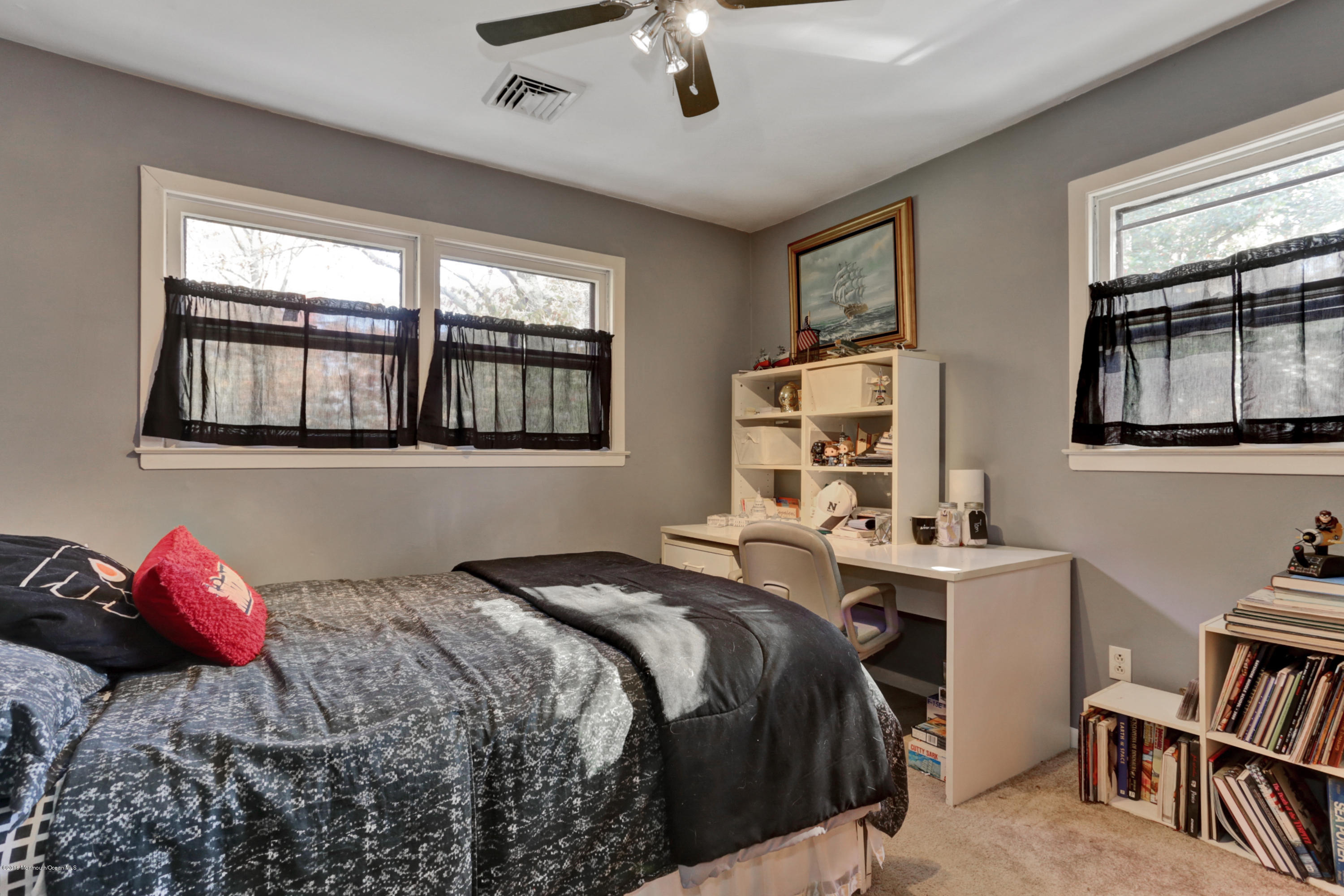 255 Portland Road Middletown, NJ 07737 - Photo 23 of 41 a bedroom with a bed furniture and a window