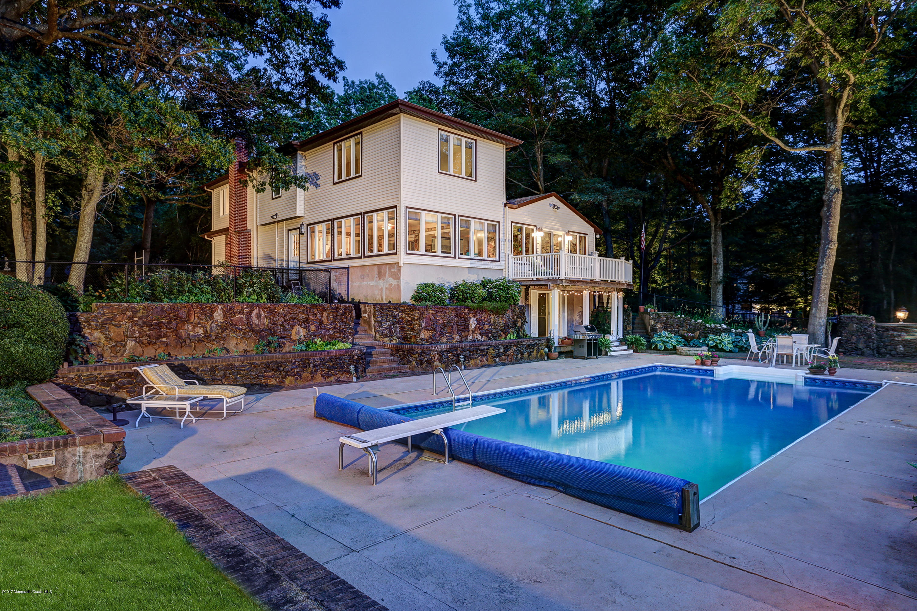 255 Portland Road Middletown, NJ 07737 - Photo 36 of 41 a view of a house with pool and sitting area
