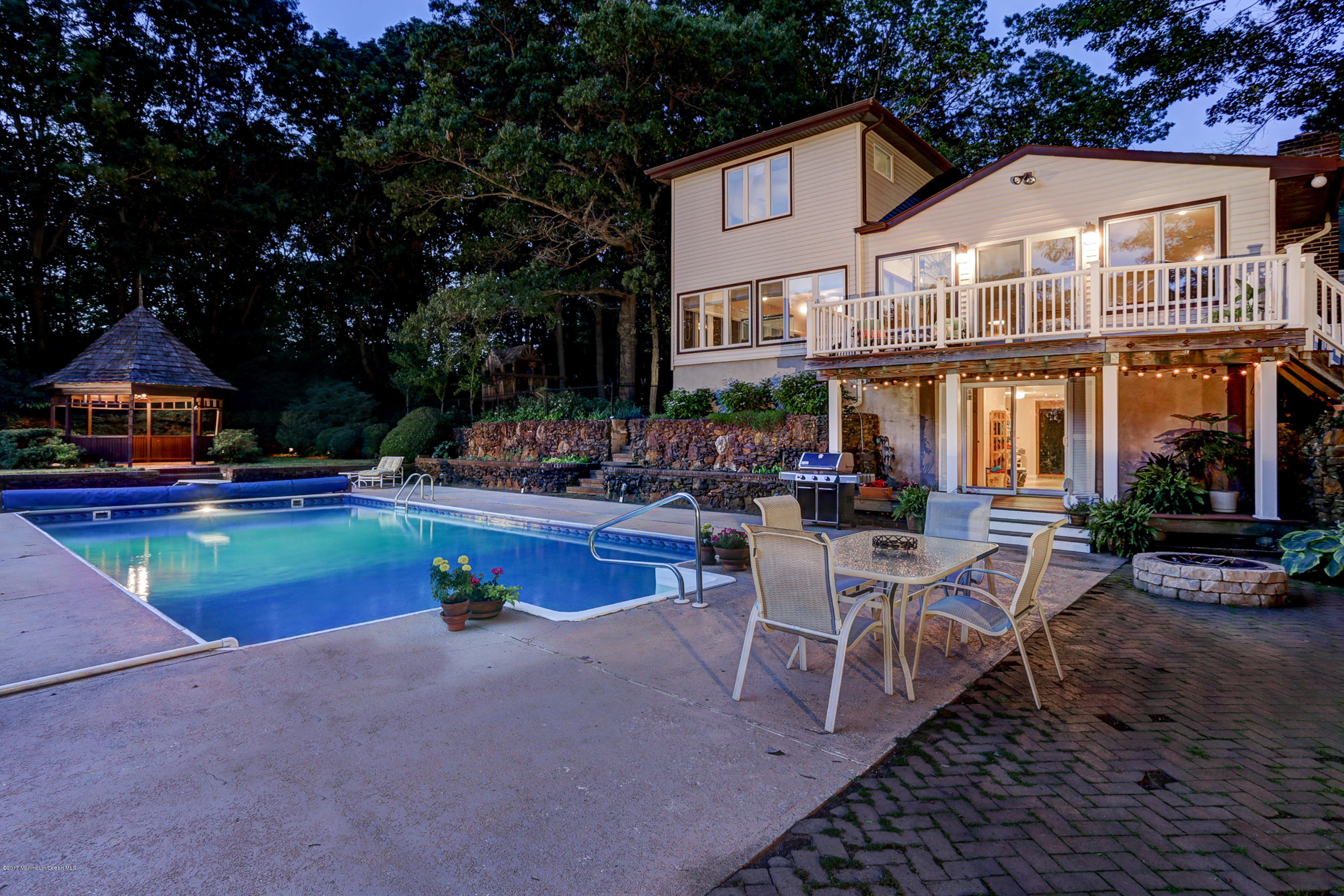 255 Portland Road Middletown, NJ 07737 - Photo 38 of 41 a view of patio with chairs and tables