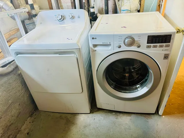 a utility room with dryer and washer
