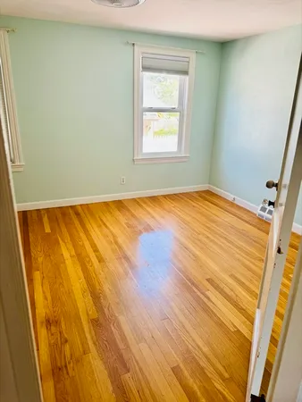 a view of an empty room and window