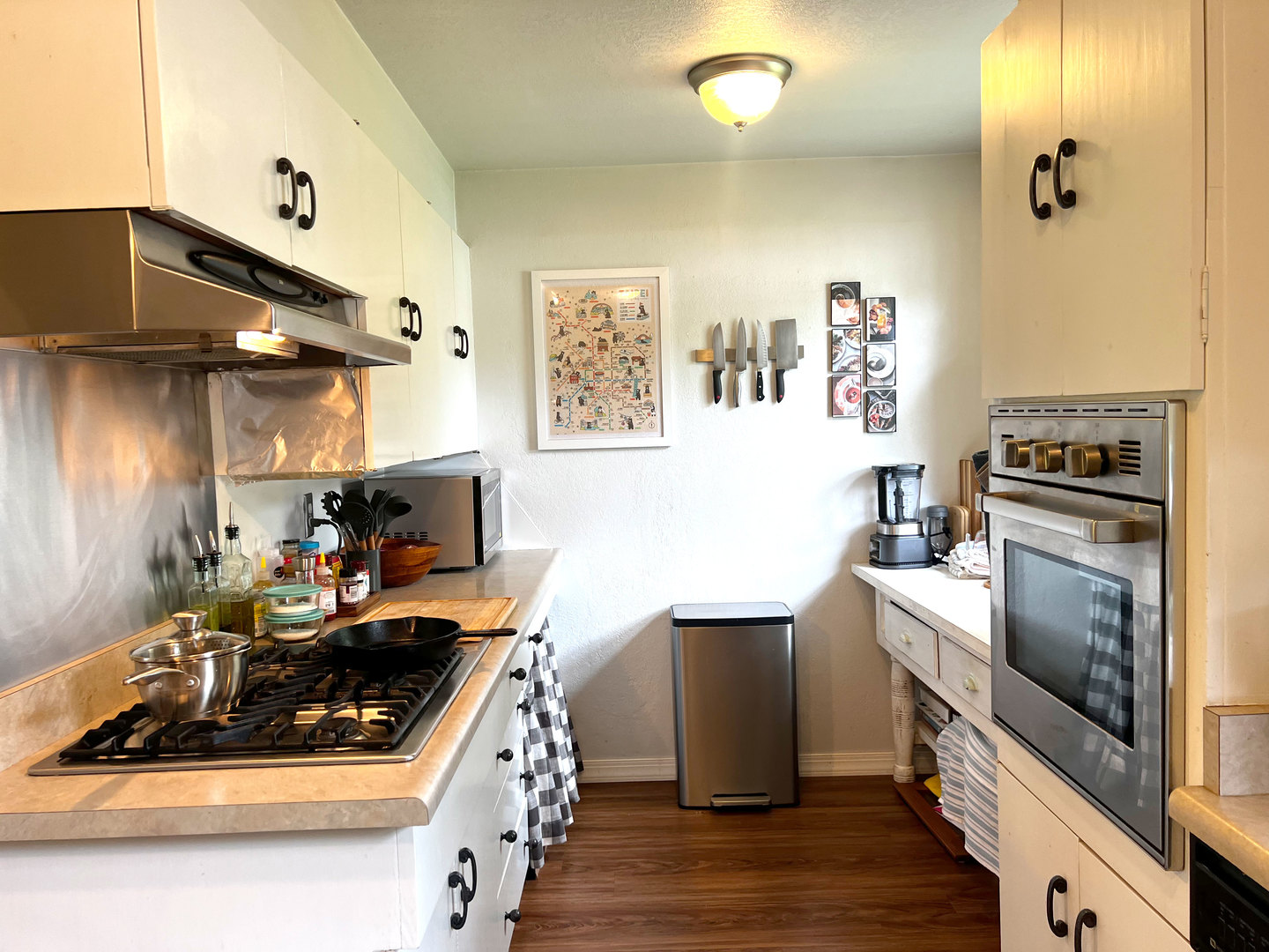 1108 West Daniel Street Champaign, IL 61821 - Photo 13 of 55 a kitchen with stainless steel appliances a stove a sink and a refrigerator