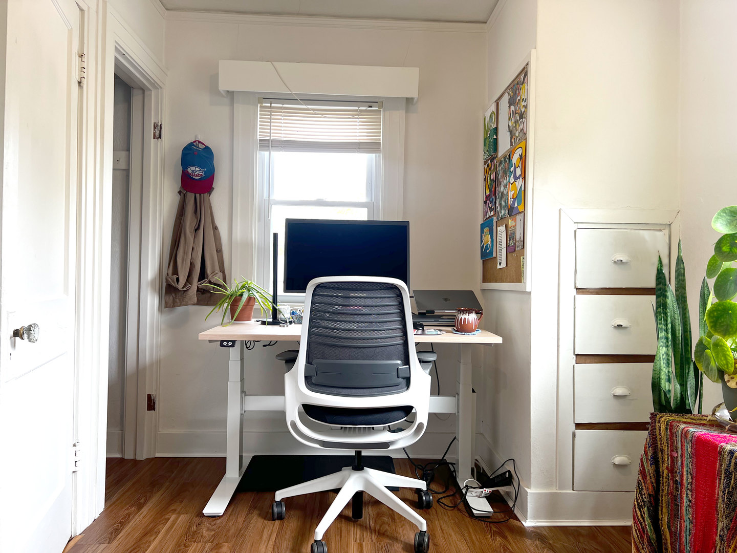 1108 West Daniel Street Champaign, IL 61821 - Photo 29 of 55 a view of a workspace with furniture and a window