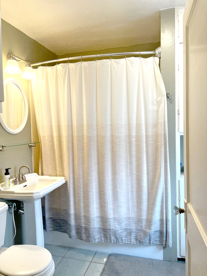 1108 West Daniel Street Champaign, IL 61821 - Photo 34 of 55 a bathroom with a sink toilet and a mirror