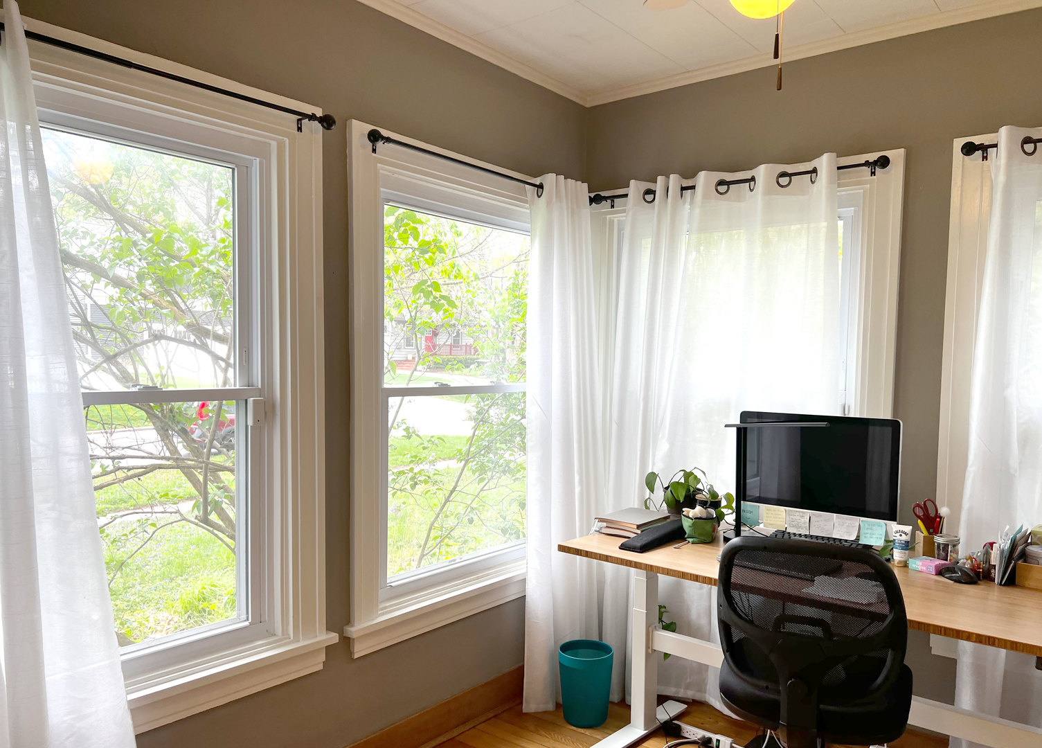 1108 West Daniel Street Champaign, IL 61821 - Photo 47 of 55 a view of a workspace with furniture and a window