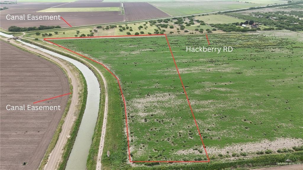 24.98 South Hackberry Road San Benito, TX 78586 - Photo 4 of 6 a view of a yard with an trees