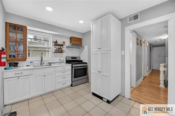 a view of a hallway with chairs