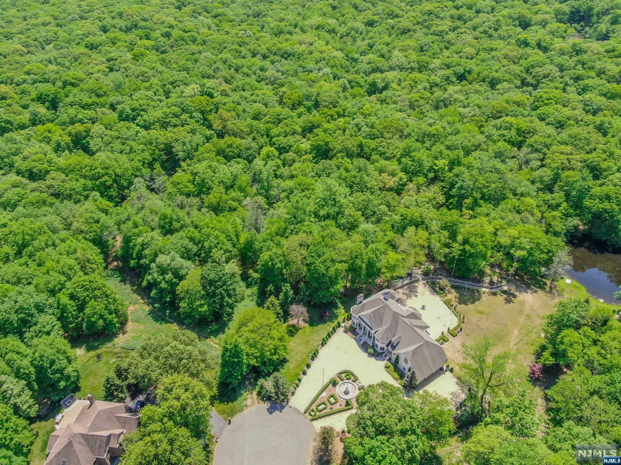 9 Vista Court Butler, NJ 07405 - Photo 5 of 11 an aerial view of a house with yard