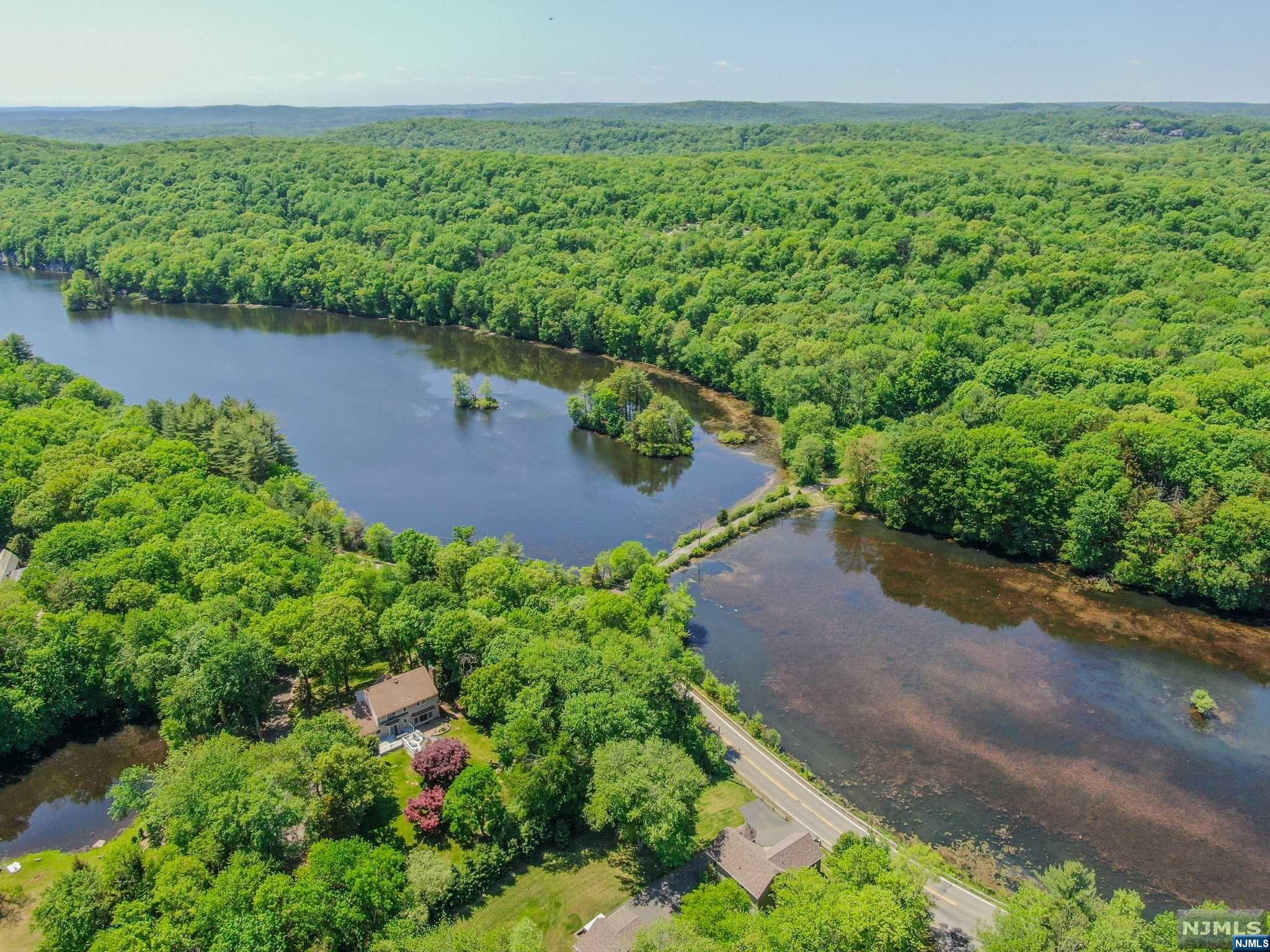 9 Vista Court Butler, NJ 07405 - Photo 10 of 11 an aerial view of a houses with a yard