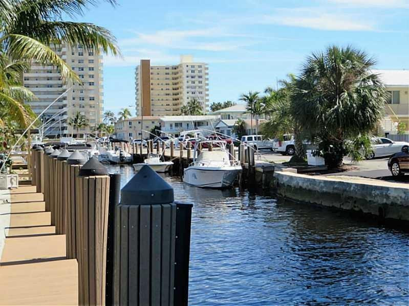1705 North Riverside Drive, Unit 5 Pompano Beach, FL 33062 - Photo 18 of 24 a view of outdoor space with seating area