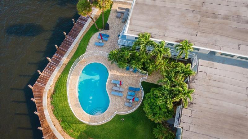 1705 North Riverside Drive, Unit 5 Pompano Beach, FL 33062 - Photo 24 of 24 a aerial view of a house with a swimming pool
