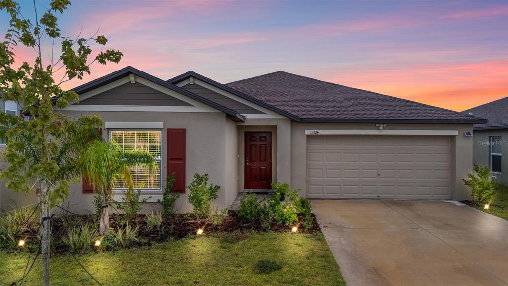 front view of a house with a yard