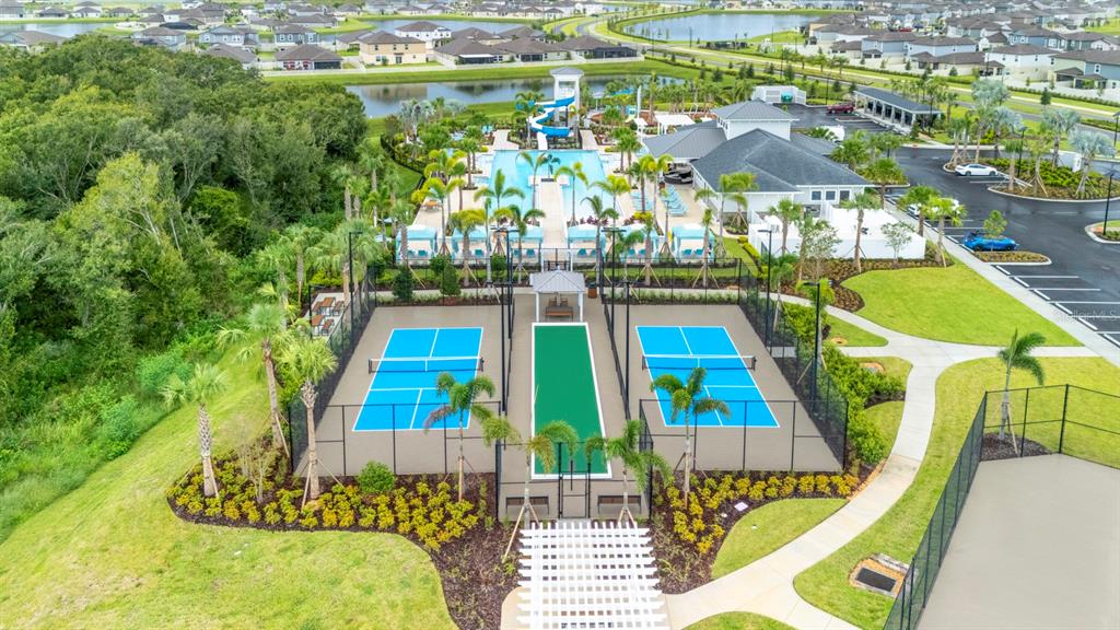 13124 Merlot Sunstone Cove Parrish, FL 34219 - Photo 12 of 45 an aerial view of a house with a swimming pool