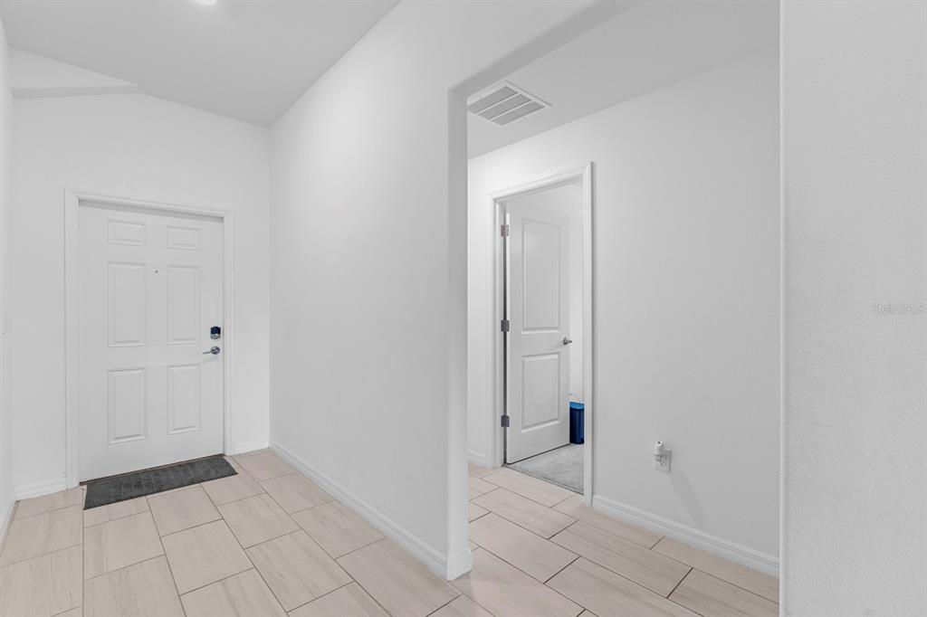 13124 Merlot Sunstone Cove Parrish, FL 34219 - Photo 17 of 45 a view of an empty room