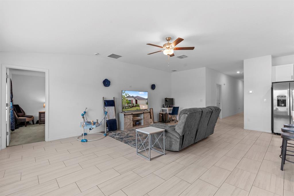 13124 Merlot Sunstone Cove Parrish, FL 34219 - Photo 30 of 45 a living room with furniture