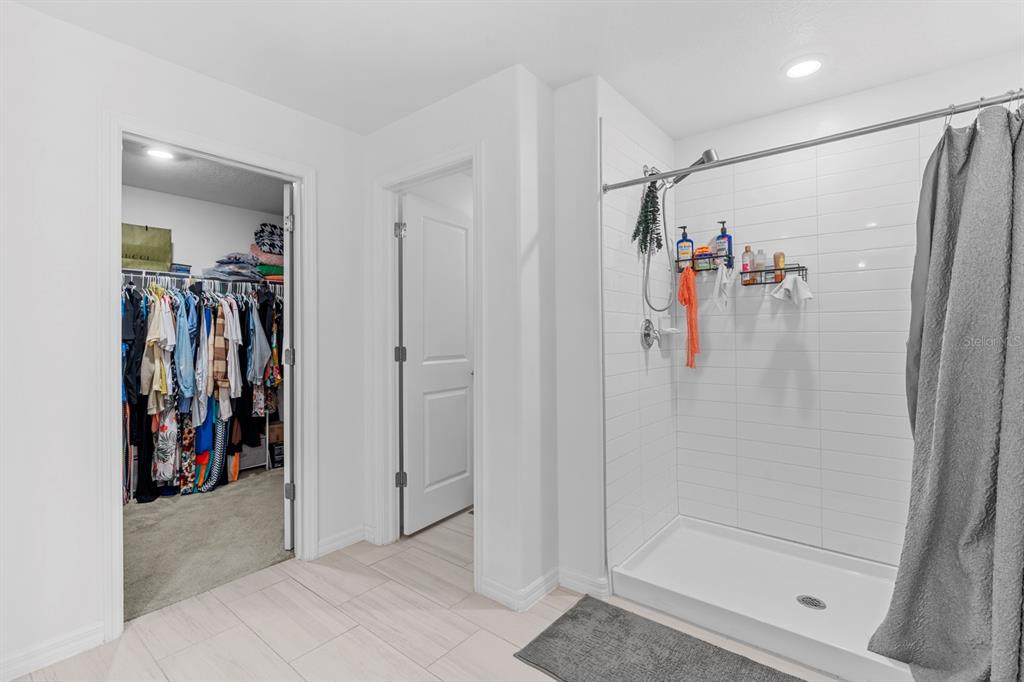 13124 Merlot Sunstone Cove Parrish, FL 34219 - Photo 37 of 45 a view of a walk in closet