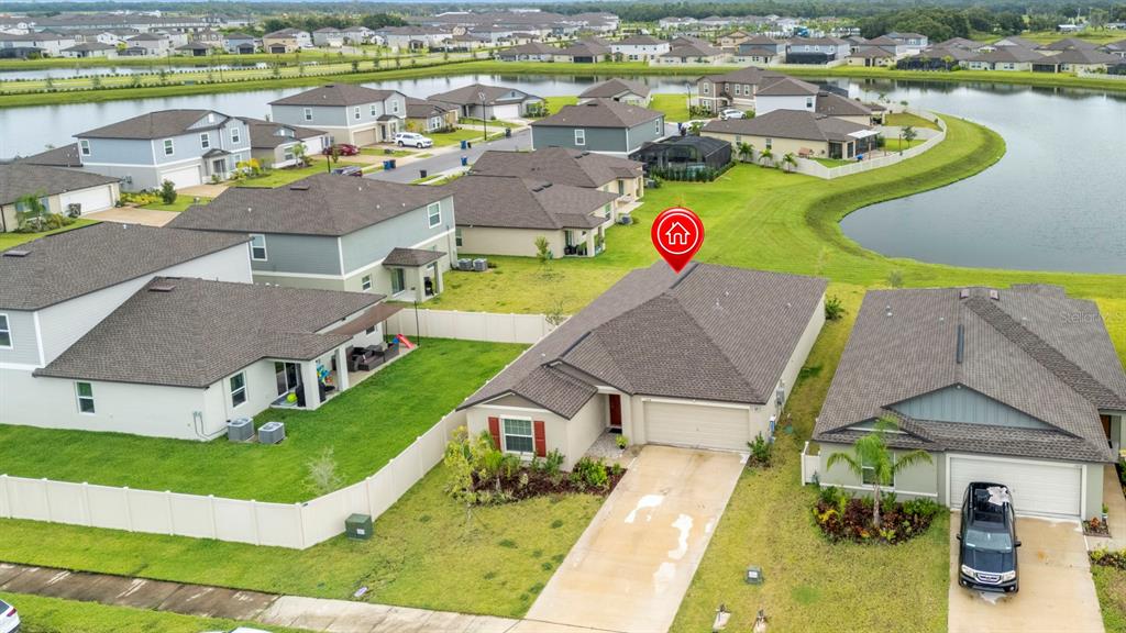 13124 Merlot Sunstone Cove Parrish, FL 34219 - Photo 6 of 45 an aerial view of a house with a swimming pool